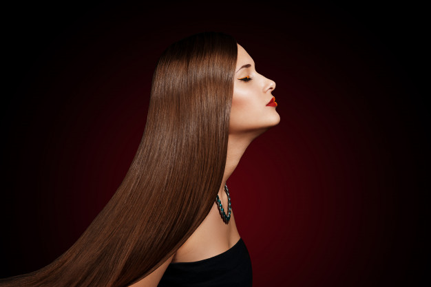 closeup-portrait-beautiful-young-woman-with-elegant-long-shiny-hair_78203-560